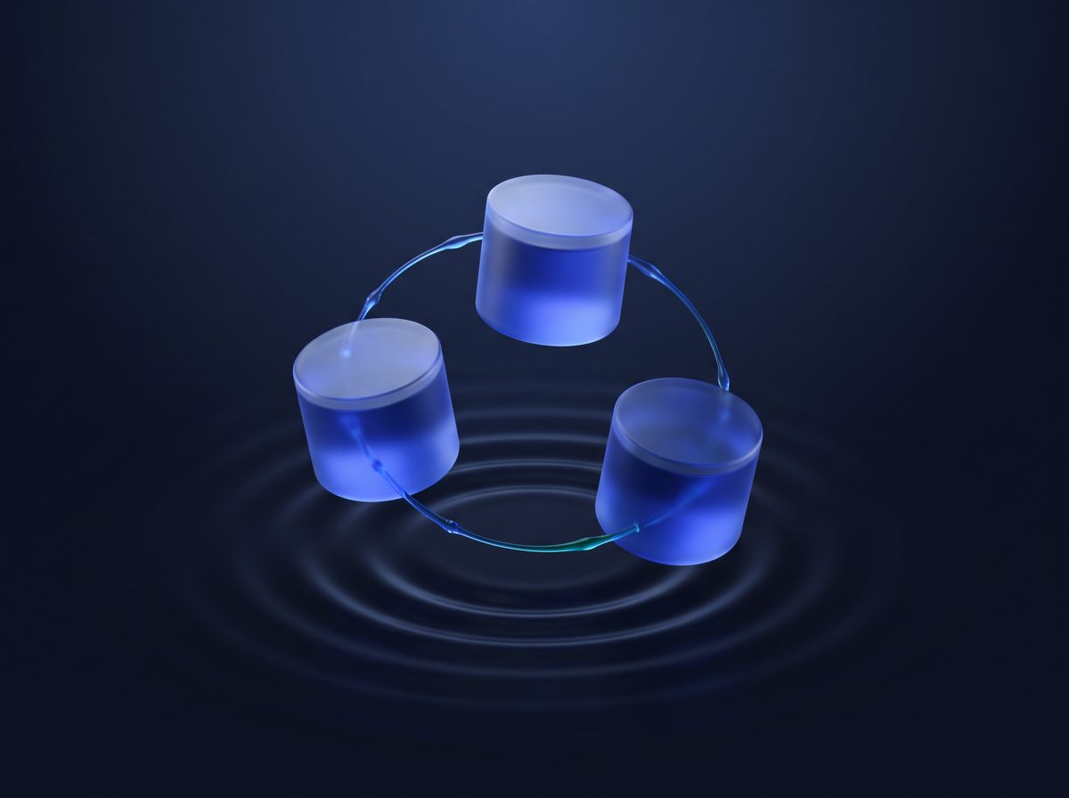 Three glass database cylinders connected in a triangle